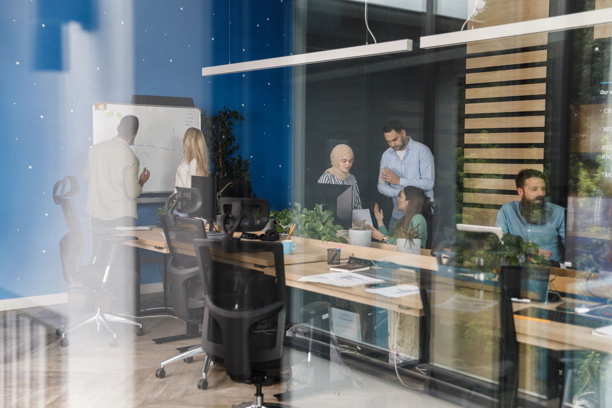 Team discussing plans in a modern office